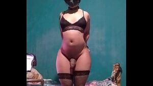 Femboy in a collar with micro penis and lingerie-clad butt