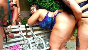 Lesbian pegging session with playful, rough energy